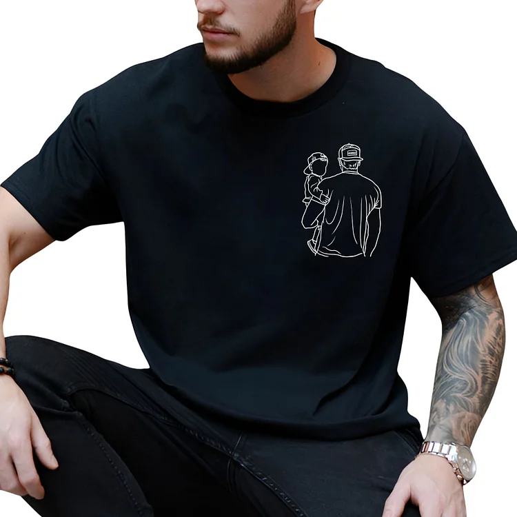 Camiseta preta com bordado em traço único de pai e filho ao pôr do sol